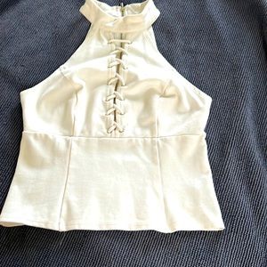 Ivory top sleeveless, tie up front zipper in the back